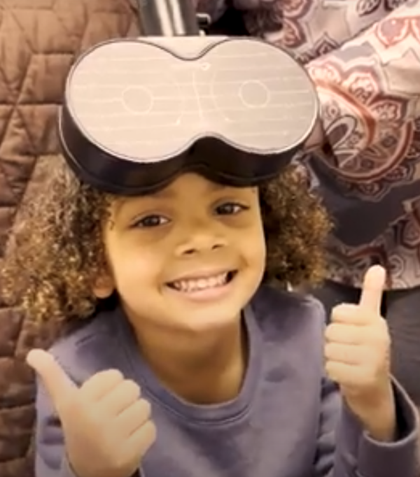 child receiving TMS as part of MeRT treatment
