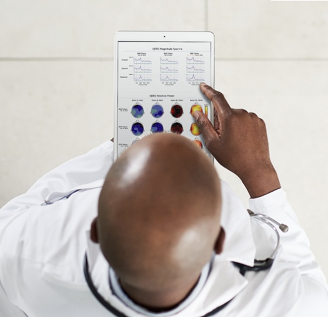 Doctor looking at an EEG