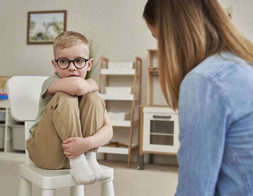 Little boy being uncommunicative in ABA therapy