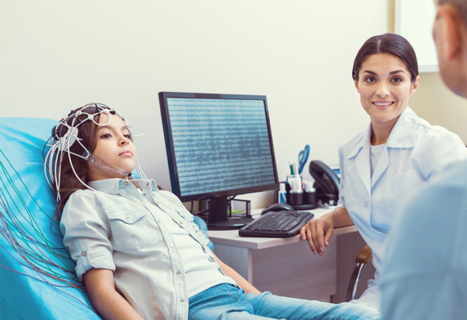 Child getting an EEG as part of MeRT Autism Treatment