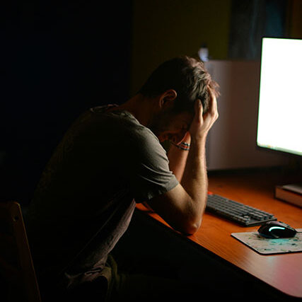 man overwhelmed from long COVID